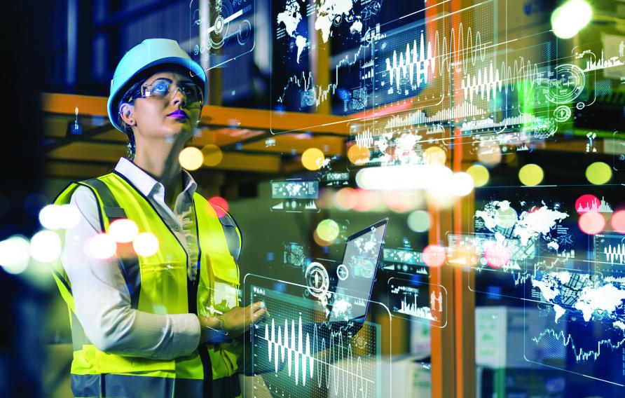 Woman in PPE surrounded by superimposed data