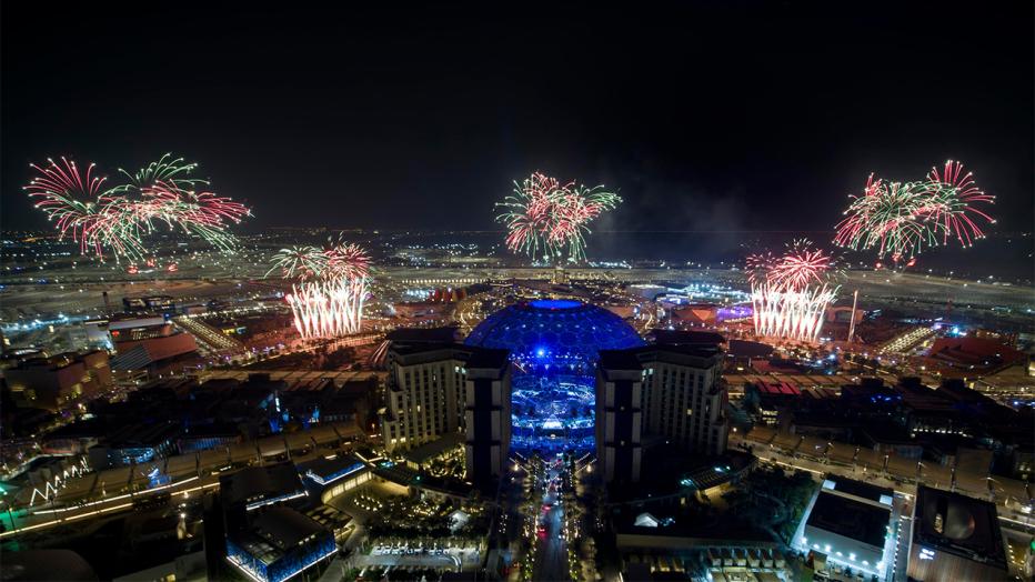 Fireworks at night over a city