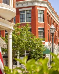 Brick building with an American flag in the foreground