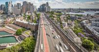 Sydney downtown traffic and aerial view of port and cityscape