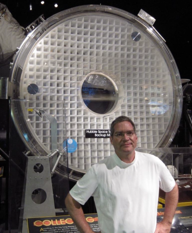 Carl Widrig with space telescope mirrors